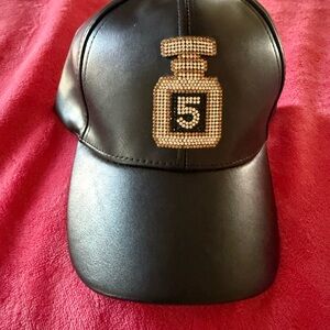 Black Leather Cap with Gold Embellishment